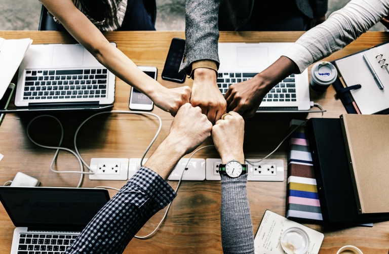 teamwork between five collegues